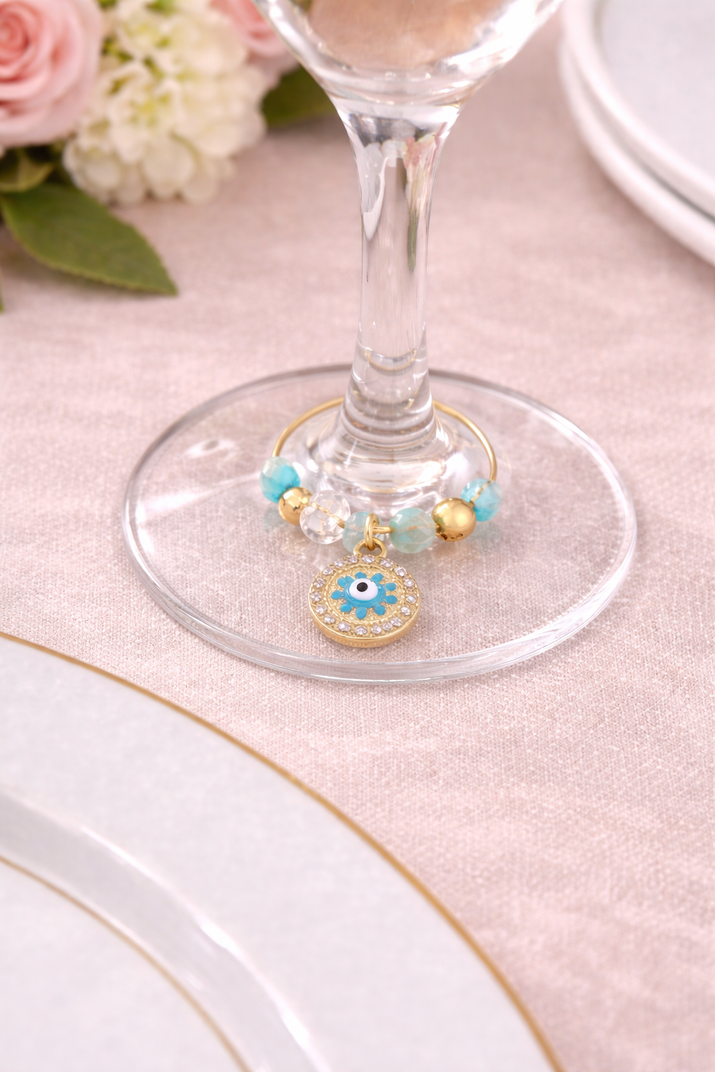 Round hamsa wine glass charms in royal blue and turquoise with beads