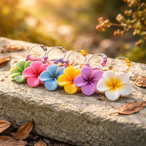 These fun and bright colored wine glass charms will brighten any day! Available in sets of 6 on silver-tone hoops with coordinated beads