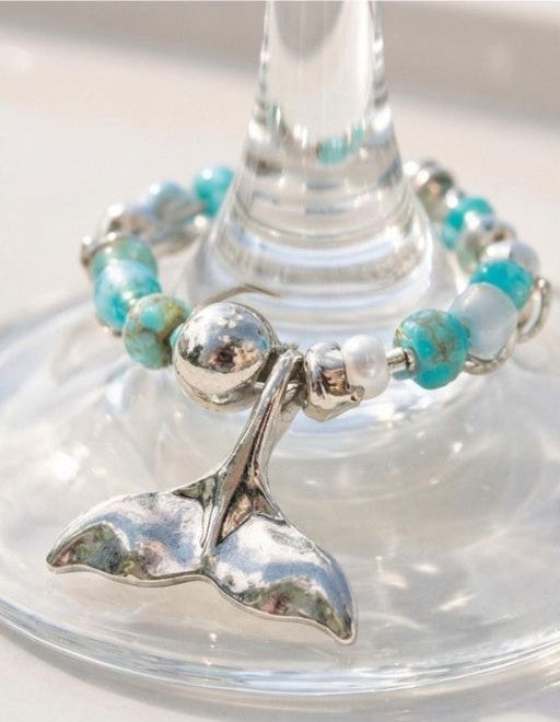 Ocean whisper sea collection wine charms styled on elegant table