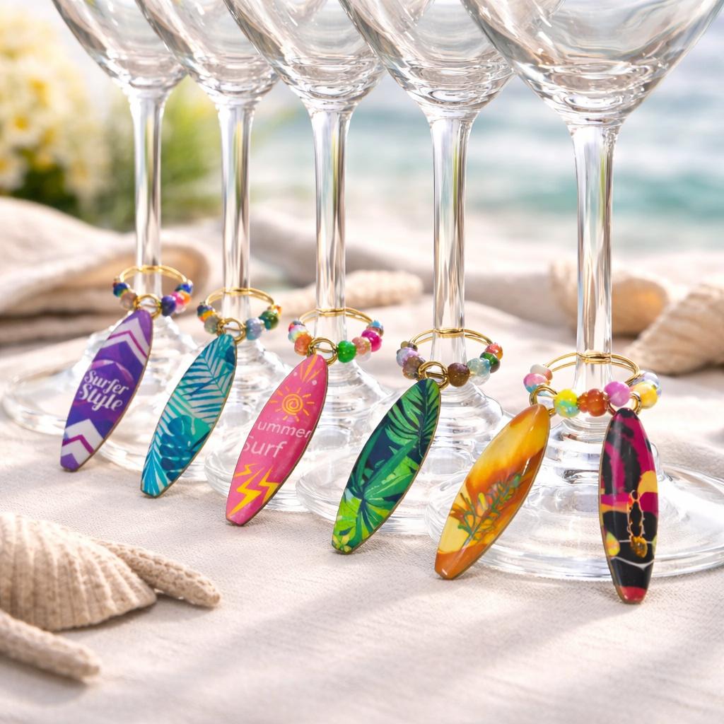  colorful surfboard wine glass charms with matching beads on gold toned hoops. Set of 6