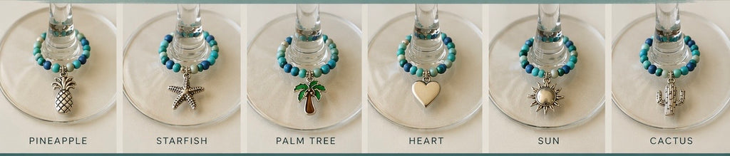 set of 6 wine glass charms made with blue and turquoise beads with silver toned charms
