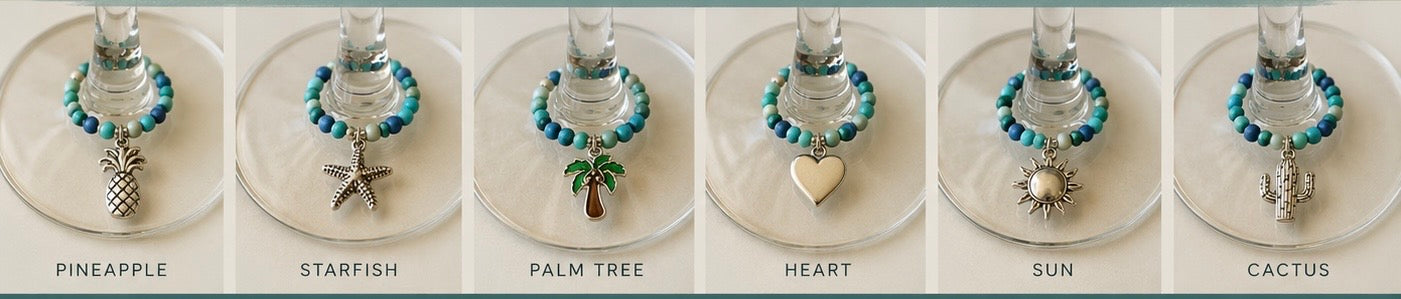set of 6 wine glass charms made with blue and turquoise beads with silver toned charms