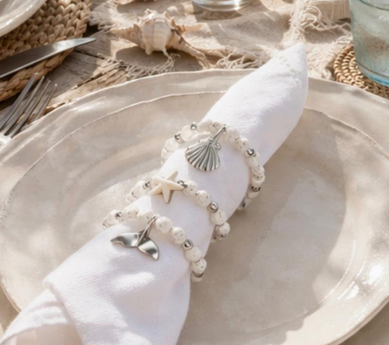 White napkin rings with silver sea charms ocean pendants set of 6